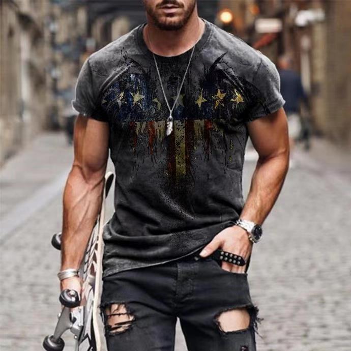 Man wearing a distressed black American flag graphic tee with ripped black jeans and accessories