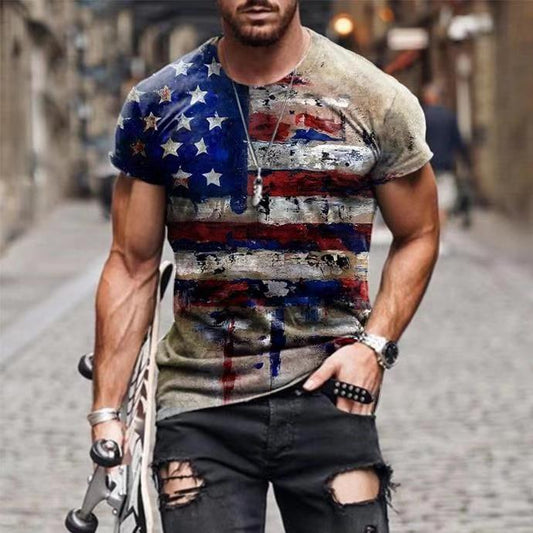 Sheila Merchandise American flag graphic tee worn by man holding skateboard in urban street