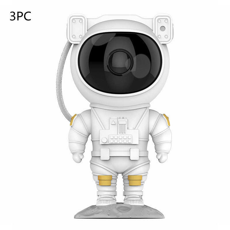 Sheila Merchandise astronaut galaxy projector lamp in white suit with black visor standing on moon base