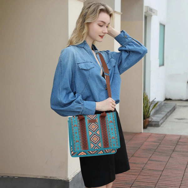 Woman wearing stylish blue blouse and black skirt carrying a colorful trendy women's accessory set tote bag