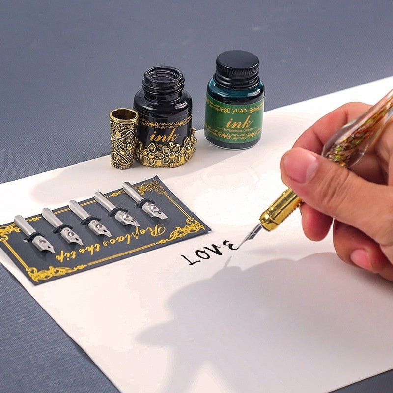 Classical Feather Pen Set by Sheila Merchandise with multiple nibs and ink bottles for elegant writing