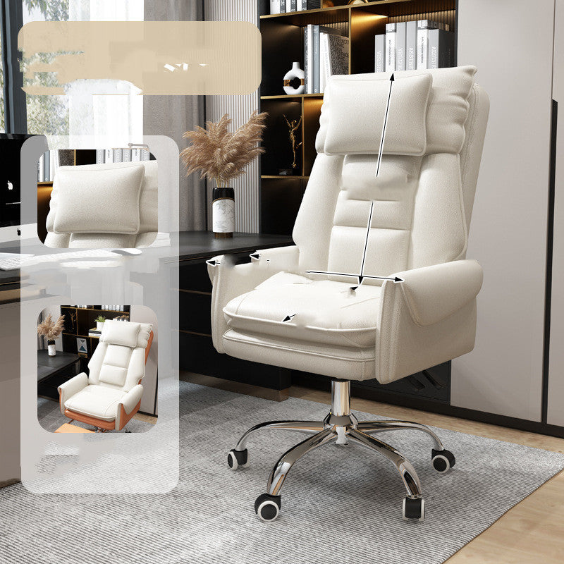 Comfortable swivel computer chair in white leather with padded cushioning and chrome base in modern office