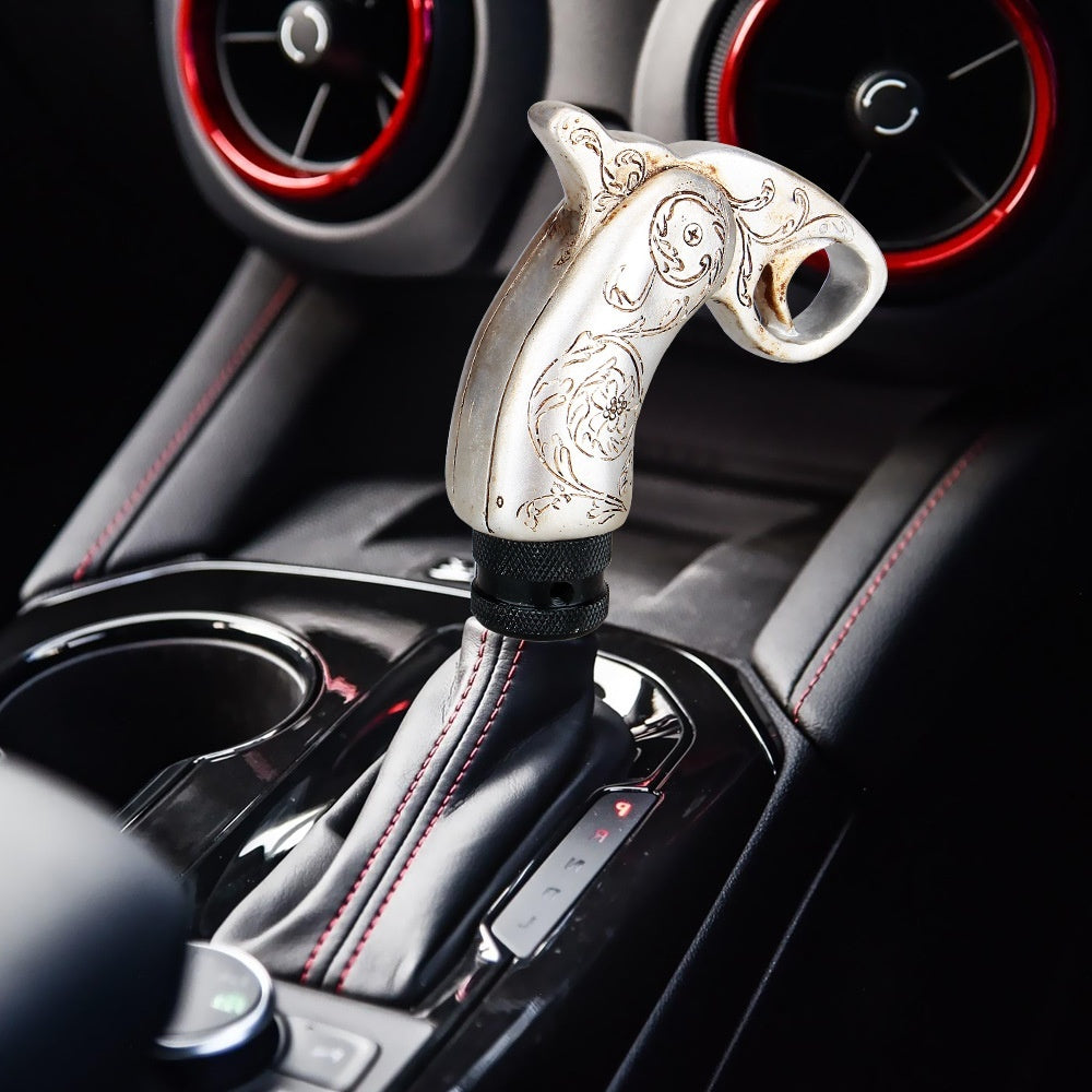 Custom resin gear shift knob shaped like a decorative hand for car interiors