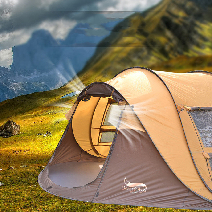 Outdoor automatic tent for 3-4 people set up on grassy mountain terrain under cloudy sky