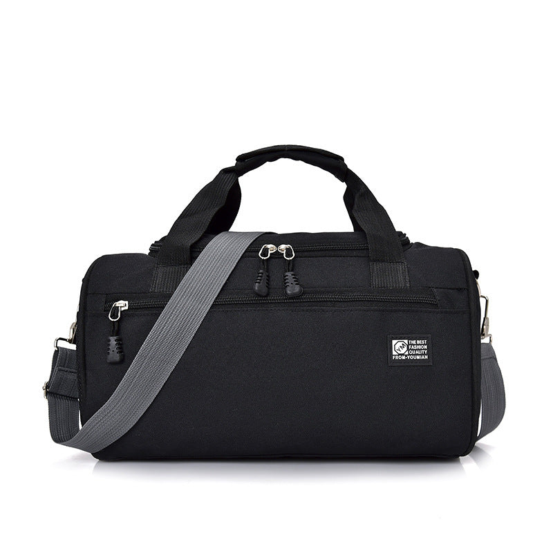 Durable sports gym bag by Sheila Merchandise in black with multiple zippered compartments and adjustable shoulder strap