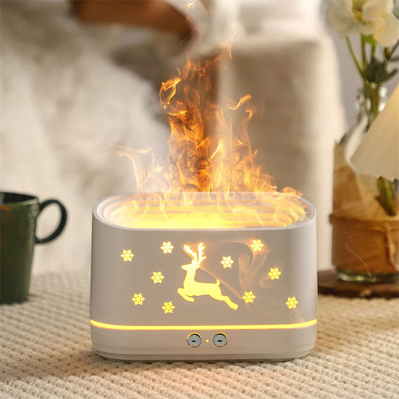 Elk flame humidifier diffuser emitting mist with glowing reindeer and snowflake design in cozy room
