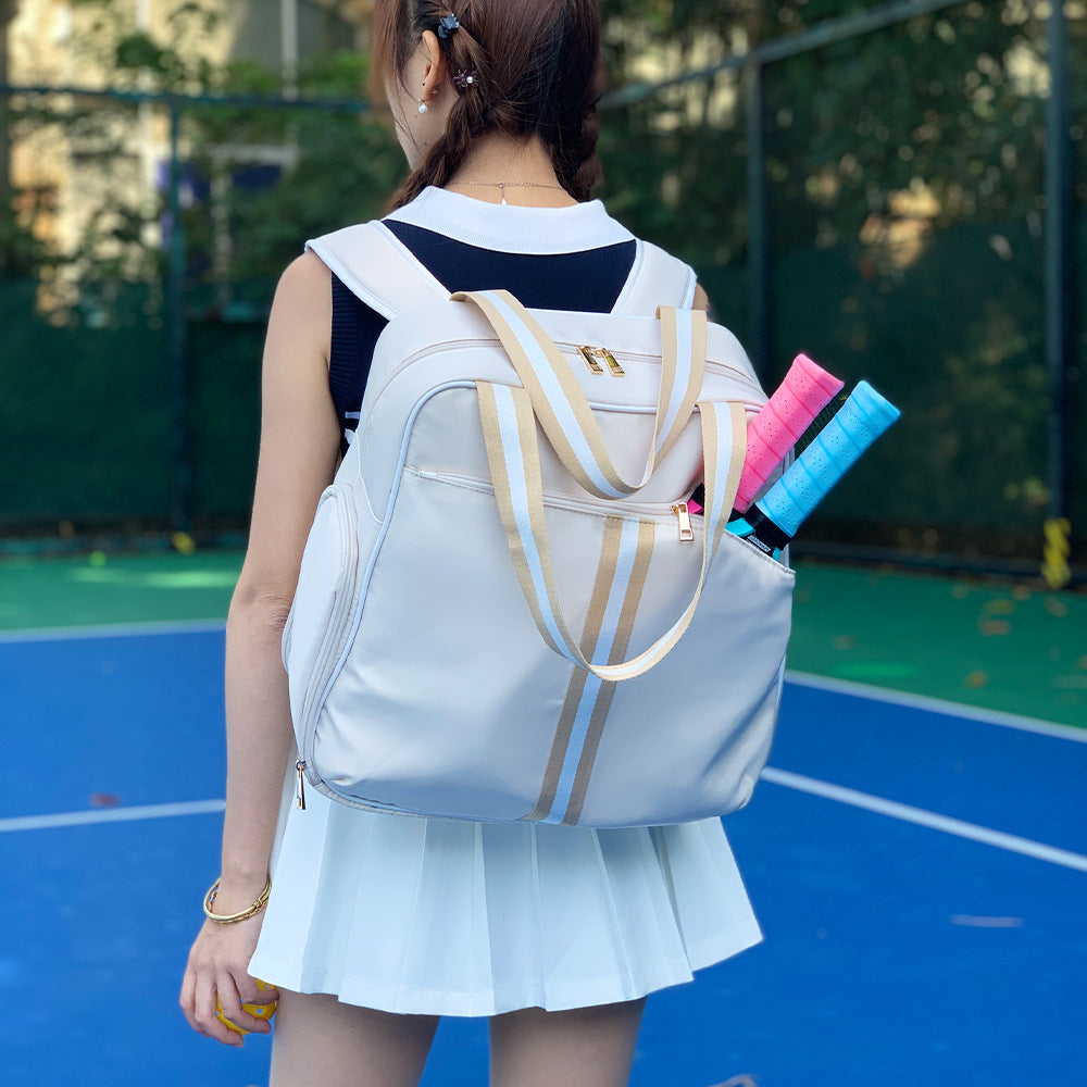 Striped outdoor neoprene travel portable fashionable tennis equipment bag by Sheila Merchandise on woman at tennis court