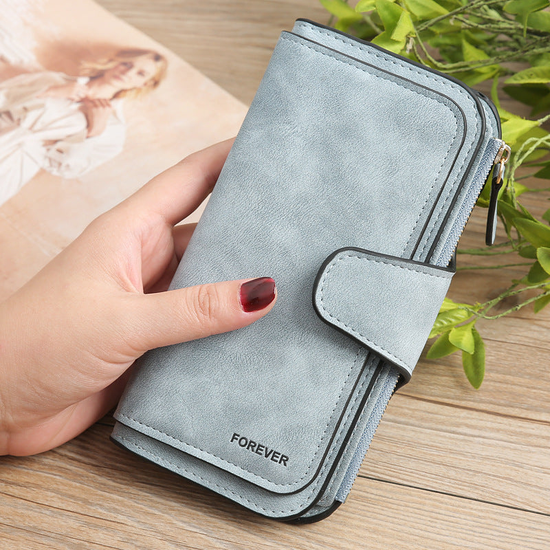 Sheila Merchandise matte PU leather multi function wallet for women in light blue with snap closure
