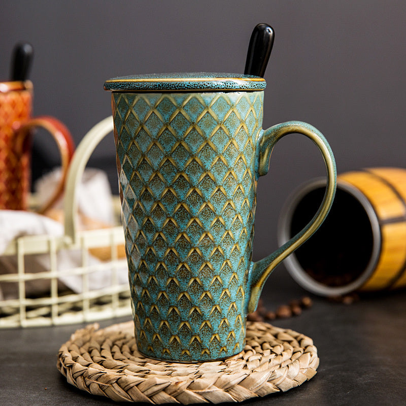 Sheila Merchandise handcrafted ceramic tea mug in vintage green with textured pattern and lid