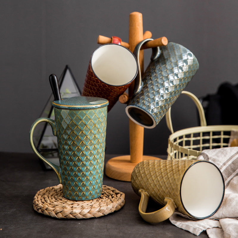 Sheila Merchandise handcrafted ceramic tea mug with vintage textured design in green and brown tones