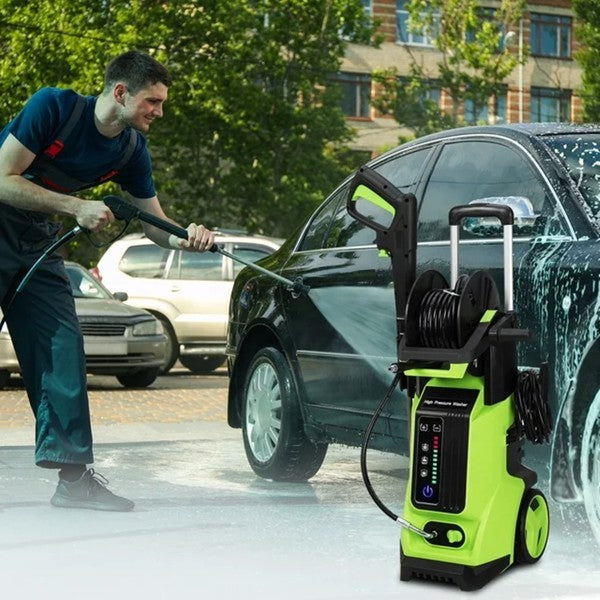 Green high pressure cleaning machine by Sheila Merchandise used for washing a car outdoors