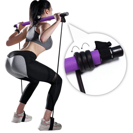 Woman using a purple home exercise bar with resistance bands for squats and strength training