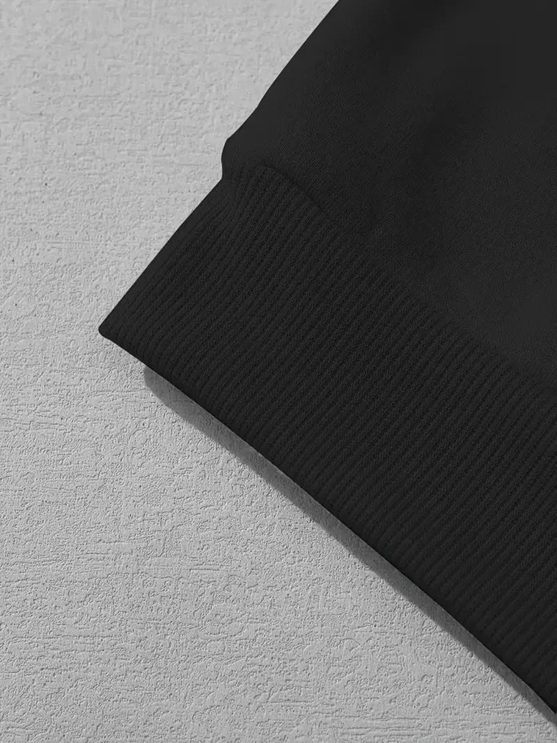 Close-up of the cuff detail on the I Love Jesus women's hoodie in black fabric