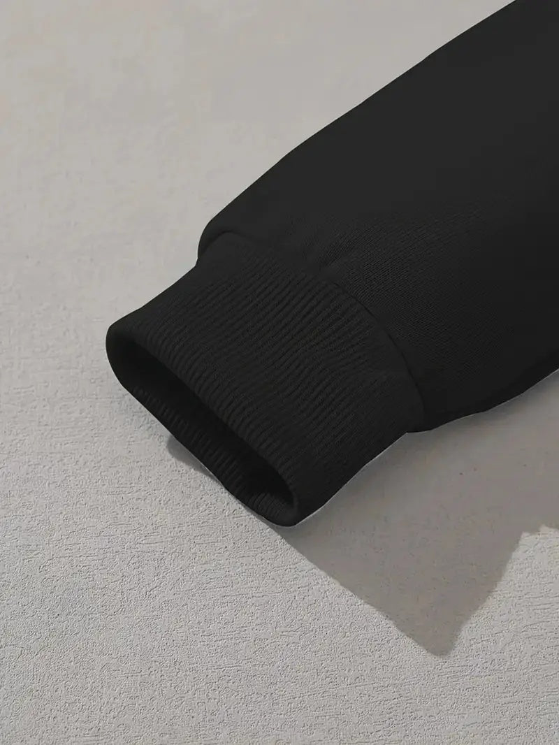 Close-up of the cuff of an I Love Jesus women's hoodie in black by Sheila Merchandise
