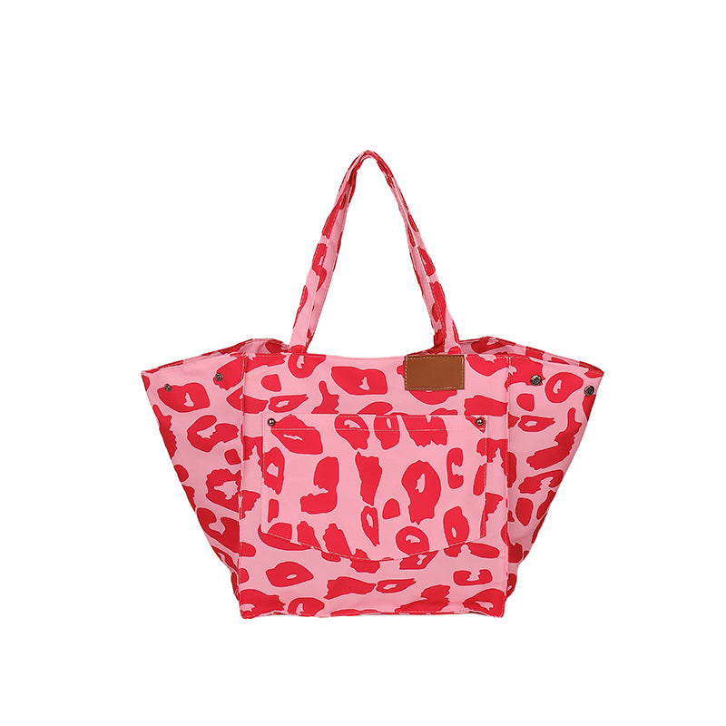 Popular leopard print tote bag with large capacity and sturdy handles by Sheila Merchandise