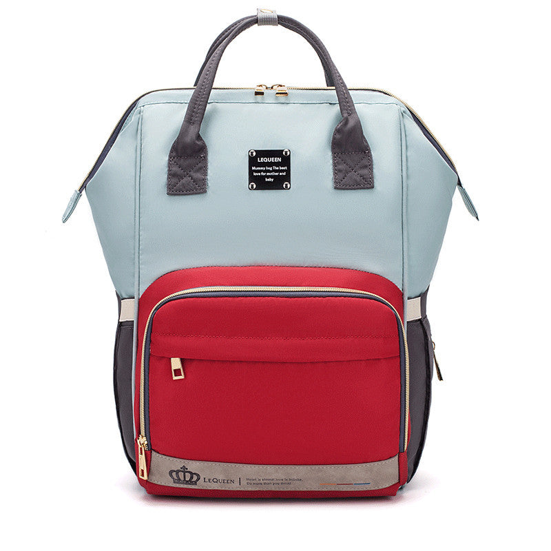 Sheila Merchandise parent-approved diaper backpack in light blue and red with multiple compartments and sturdy handles
