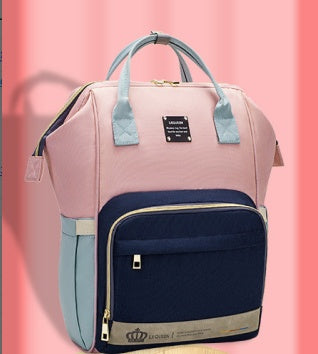 Sheila Merchandise parent-approved diaper backpack in pink and navy with multiple compartments