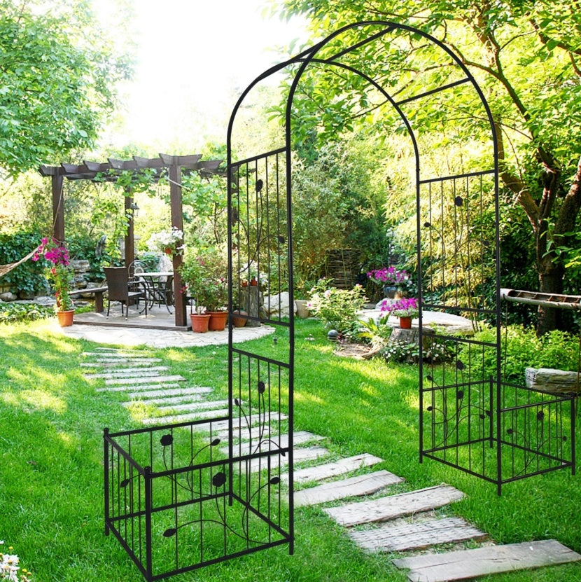 Elegant metal garden arch with floral design, perfect for enhancing outdoor landscapes and pathways
