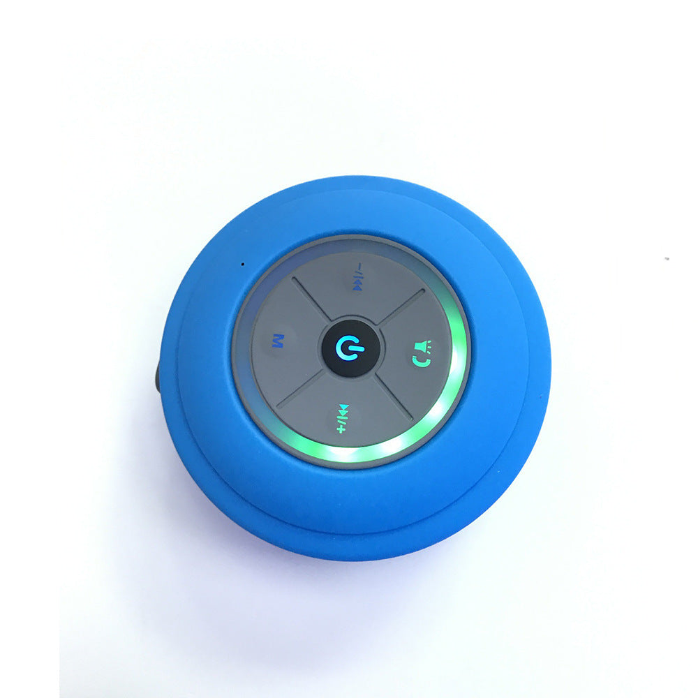 Blue mini waterproof Bluetooth speaker from Sheila Merchandise with control buttons and LED light ring
