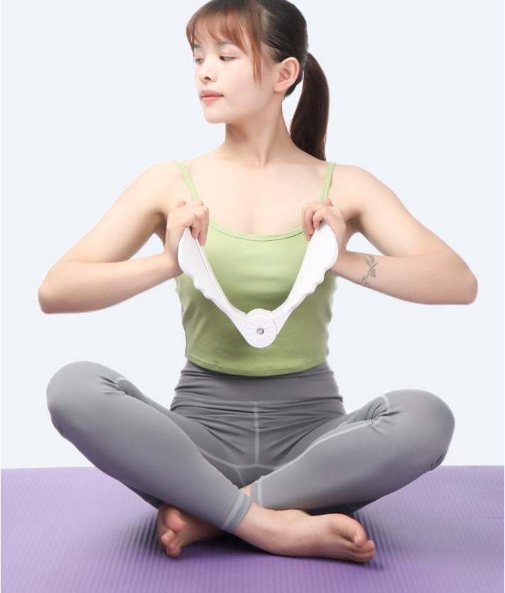 Woman sitting cross-legged using Sheila Merchandise pelvic floor muscle trainer hip trainer bladder control inner thigh device