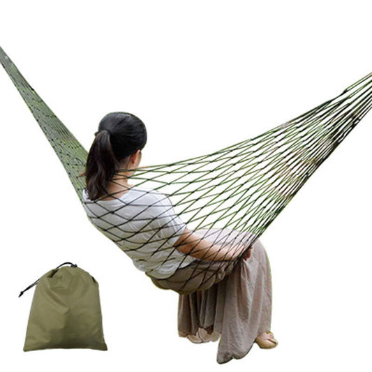 Sheila Merchandise portable hammock swing in green with carrying bag and person relaxing inside