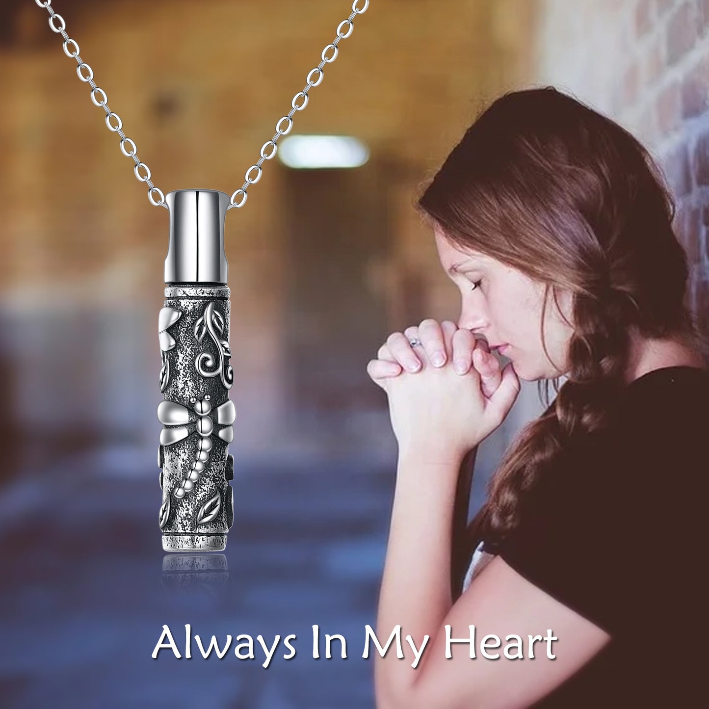 Dragonfly urn pendant for ashes by Sheila Merchandise shown with a praying woman and heartfelt message
