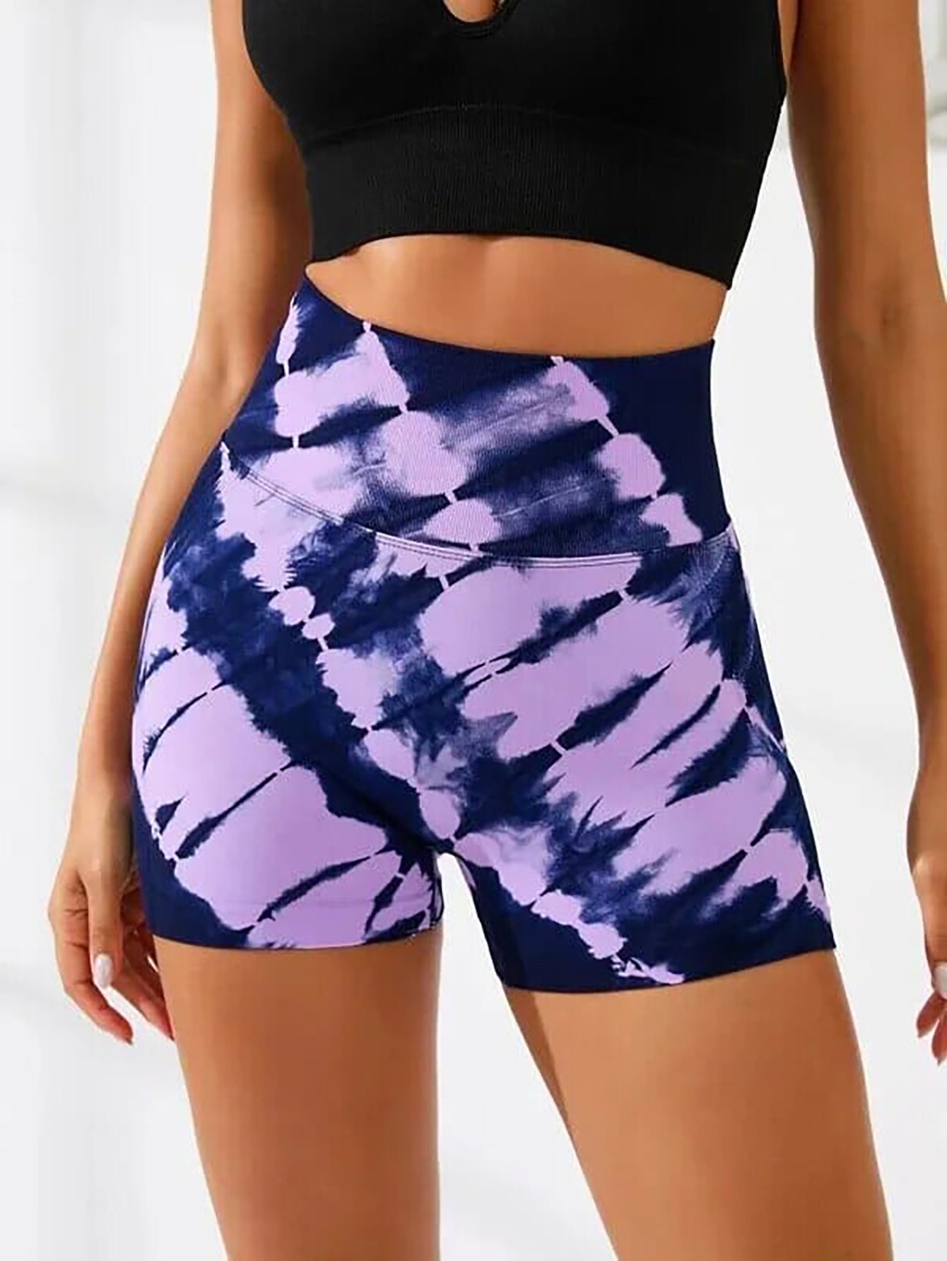 Seamless high waisted yoga shorts in purple and navy tie dye design by Sheila Merchandise