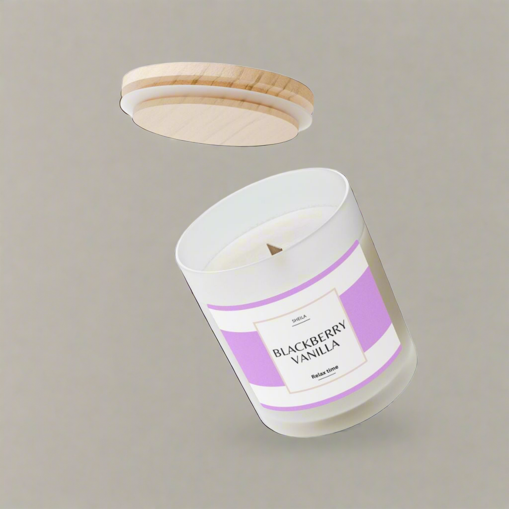 Blackberry vanilla candle in a glass jar with a wooden lid for a cozy home ambiance