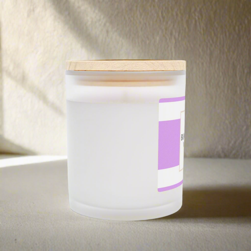 Blackberry vanilla candle in a frosted glass jar with a wooden lid for a soothing home ambiance