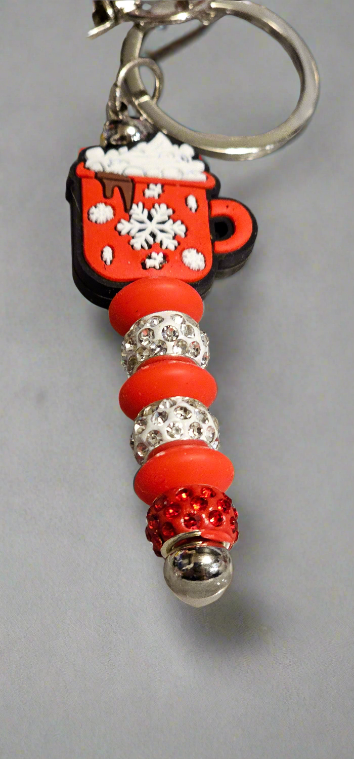 Red coffee cup keychain with decorative beads, perfect stylish keychains for coffee enthusiasts