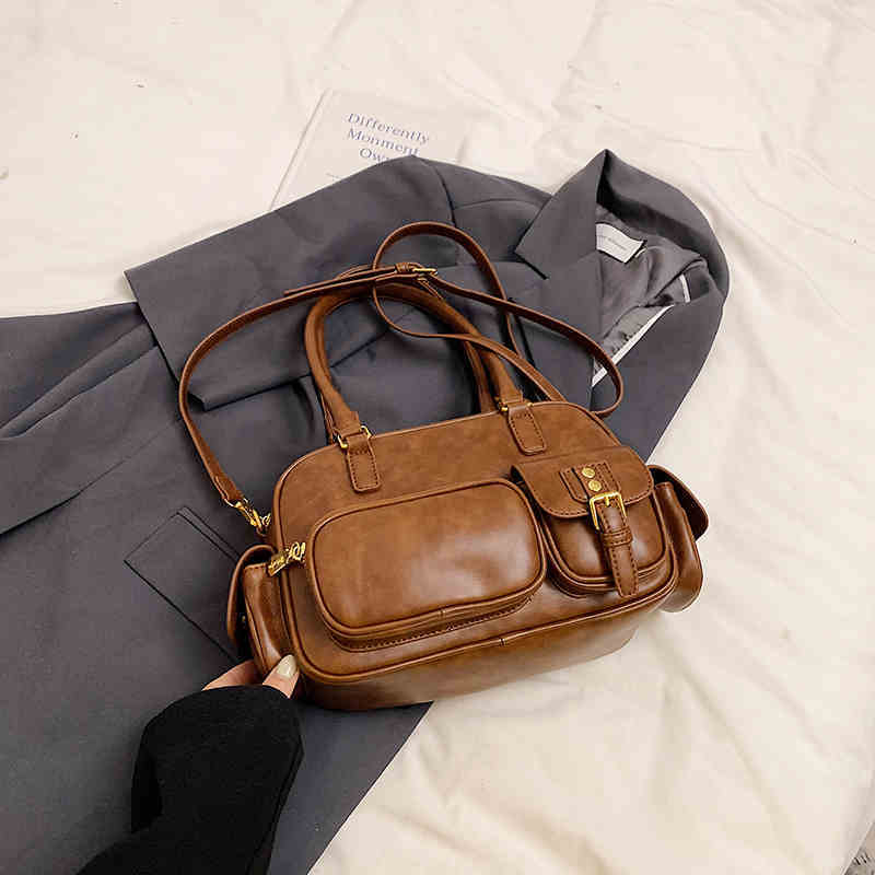 Brown women's shoulder underarm Boston bag by Sheila Merchandise stylish underarm purse on gray coat