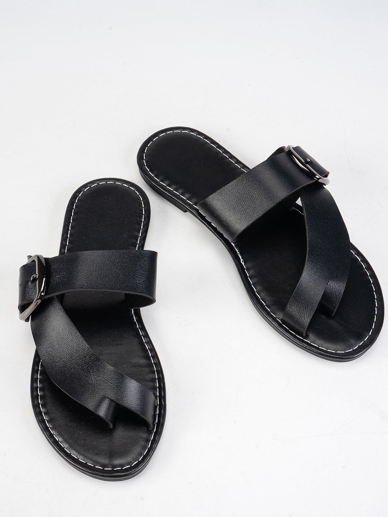 Black summer beach flat sandals with buckle toe clip and stitched sole by Sheila Merchandise