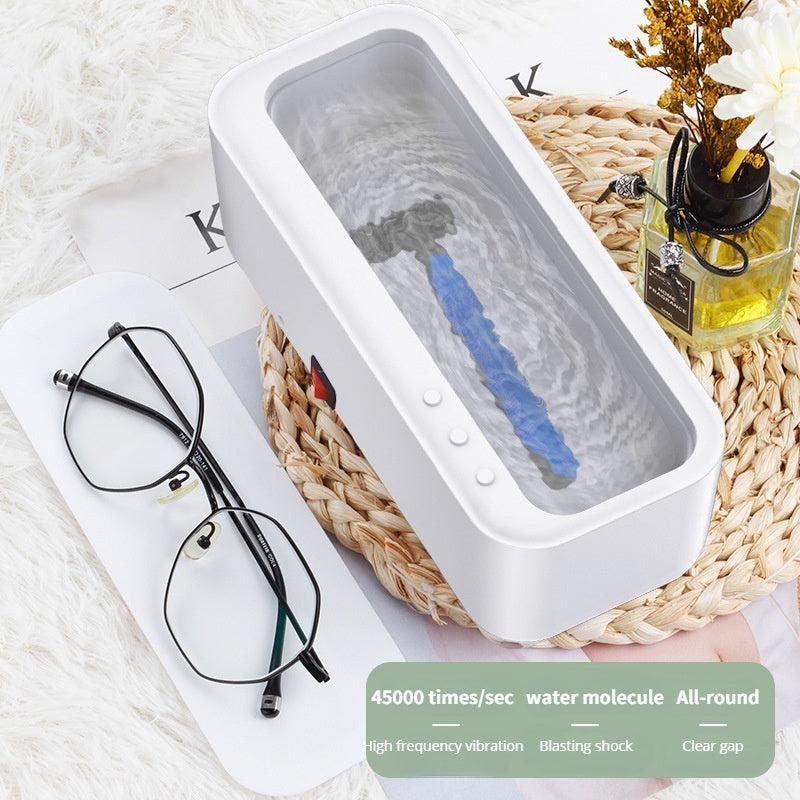 Ultrasonic glasses cleaner by Sheila Merchandise cleaning eyeglasses with high frequency vibration and blasting shock