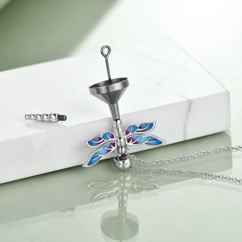 Sterling silver dragonfly urn necklace with blue and purple enamel wings and a small funnel tool