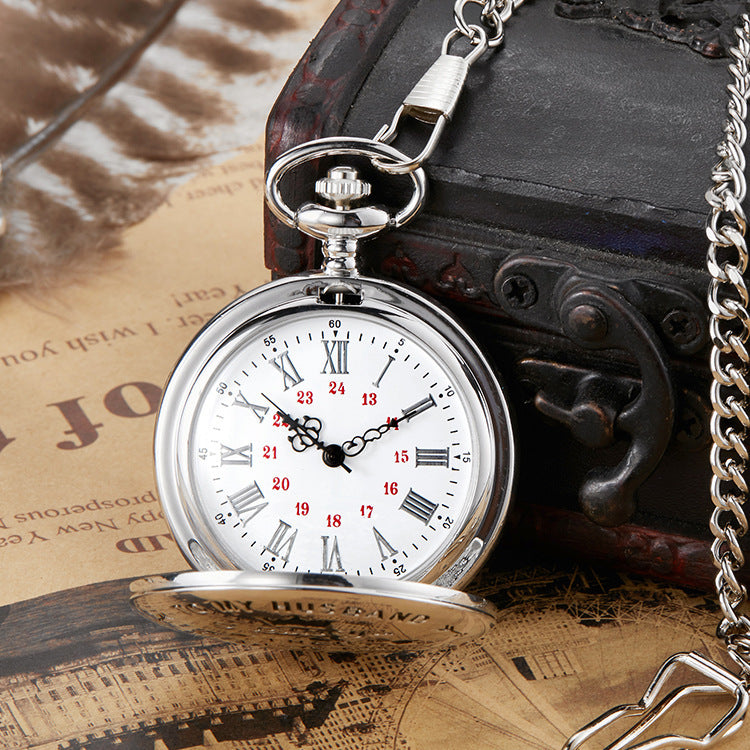 Engraving vintage quartz pocket watch with silver chain and Roman numeral dial on antique background
