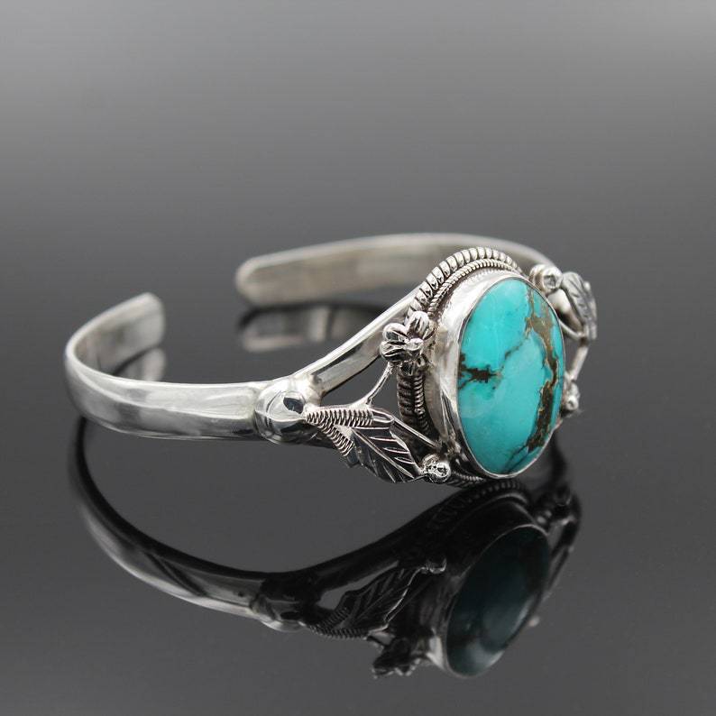 Women's vintage turquoise bracelet for women with silver engraving and floral details