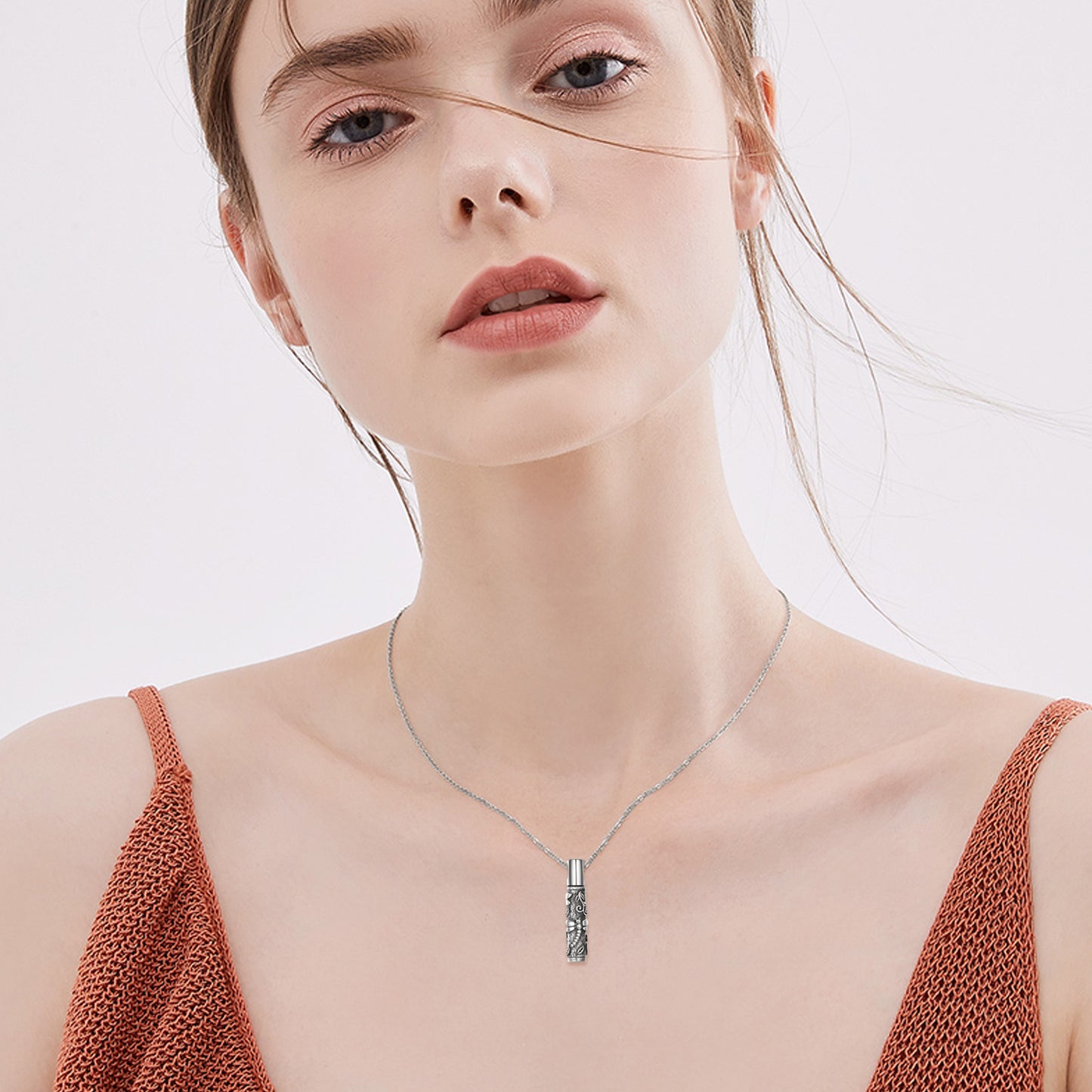 Dragonfly urn pendant for ashes 925 sterling silver necklace worn by woman with light skin and brown eyes