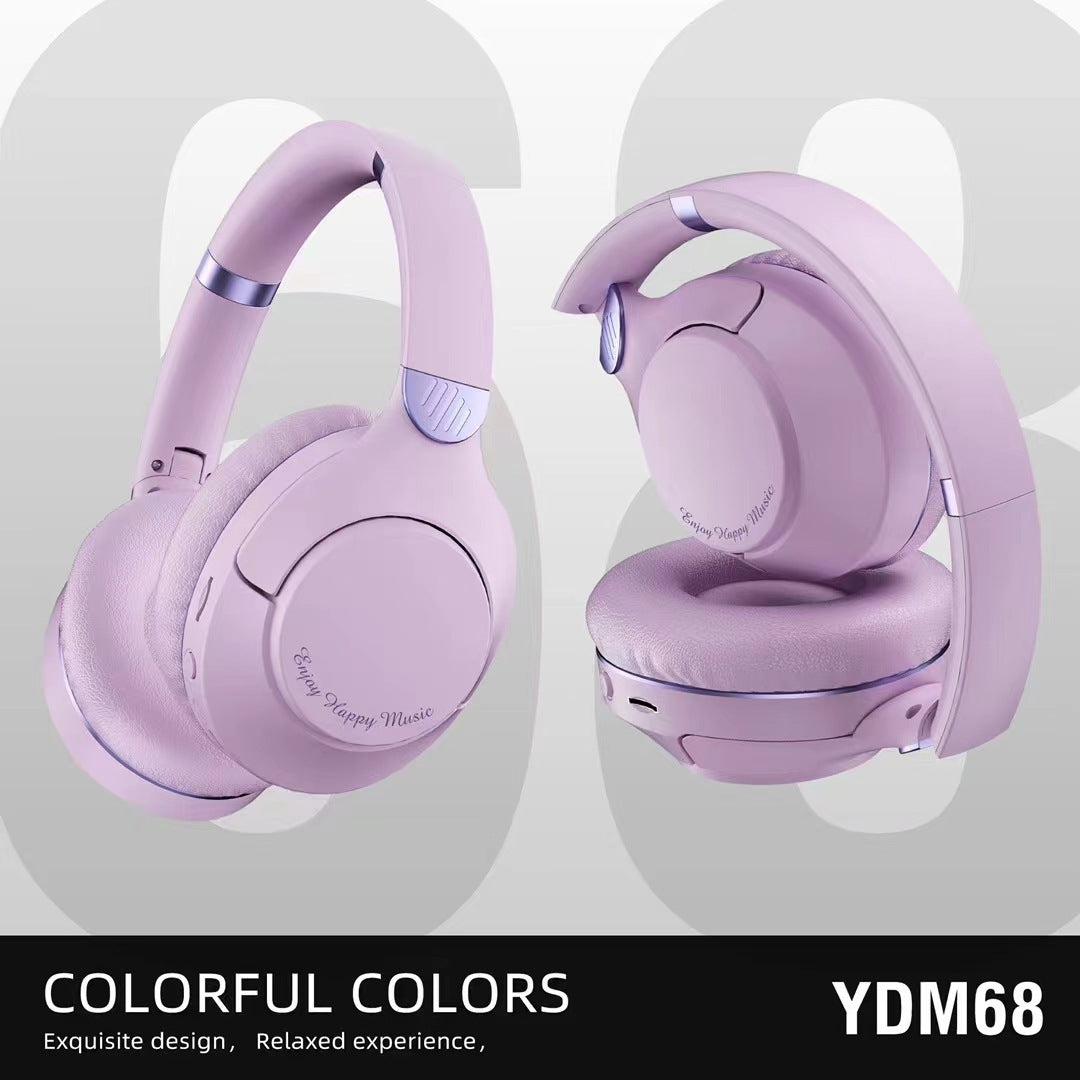 Purple wireless sports headphones with cushioned ear cups and adjustable headband for comfortable wear