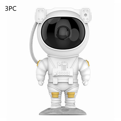 Sheila Merchandise astronaut galaxy projector lamp in white suit with black visor standing on moon base