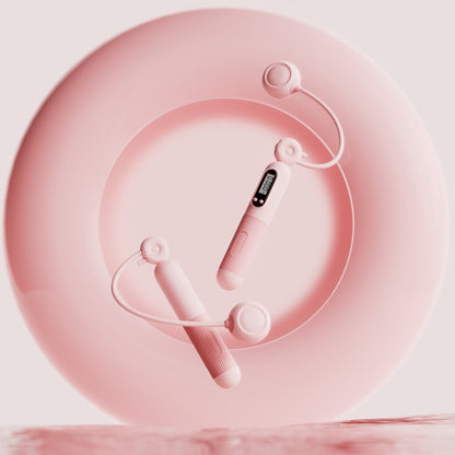 Pink cardio jump rope with counter and adjustable handles from Sheila Merchandise on a matching pink background