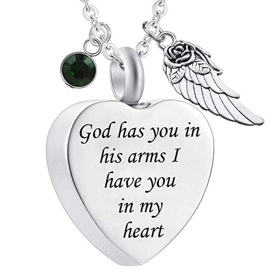Heart-shaped wing urn cremation jewelry pendant with engraved message and green gemstone charm