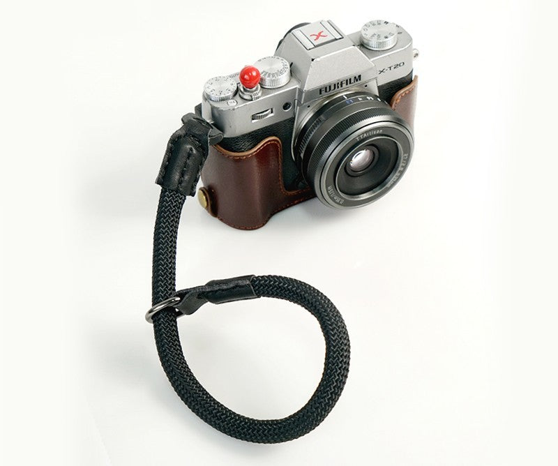 Durable camera wrist strap attached to Fujifilm camera with brown leather case by Sheila Merchandise