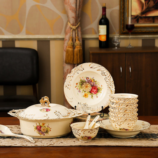 Sheila Merchandise European floral pottery dish set featuring floral patterns with gold accents on serving and dinnerware pieces