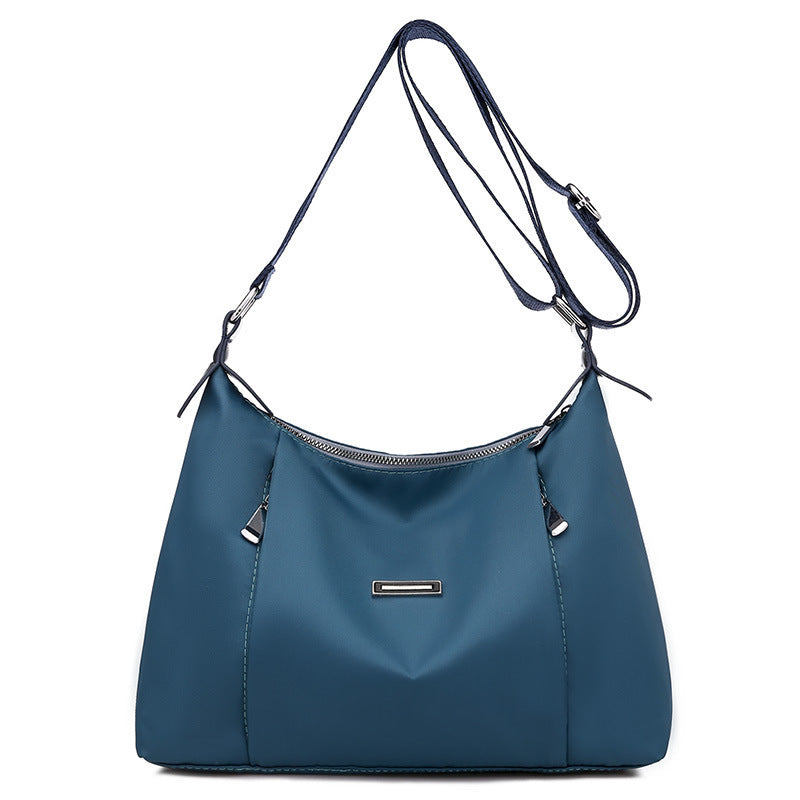 Sheila Merchandise blue everyday fashion handbag for women with adjustable shoulder strap and zip closure