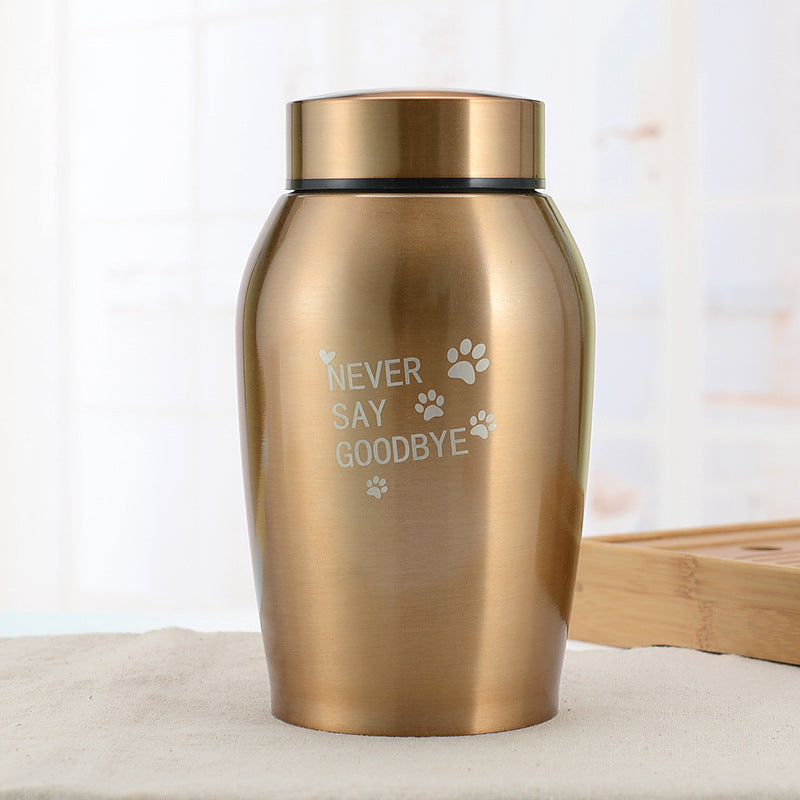Metal Seal Funeral Products stainless steel pet urn with Never Say Goodbye engraved paw print design