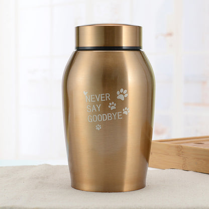 Metal Seal Funeral Products stainless steel pet urn with Never Say Goodbye engraved paw print design