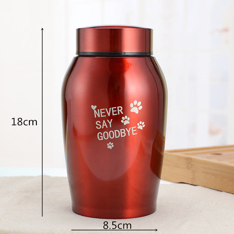 Red stainless steel pet urn with never say goodbye text and paw prints 18cm height