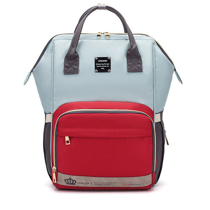 Sheila Merchandise parent-approved diaper backpack in light blue and red with multiple compartments and sturdy handles