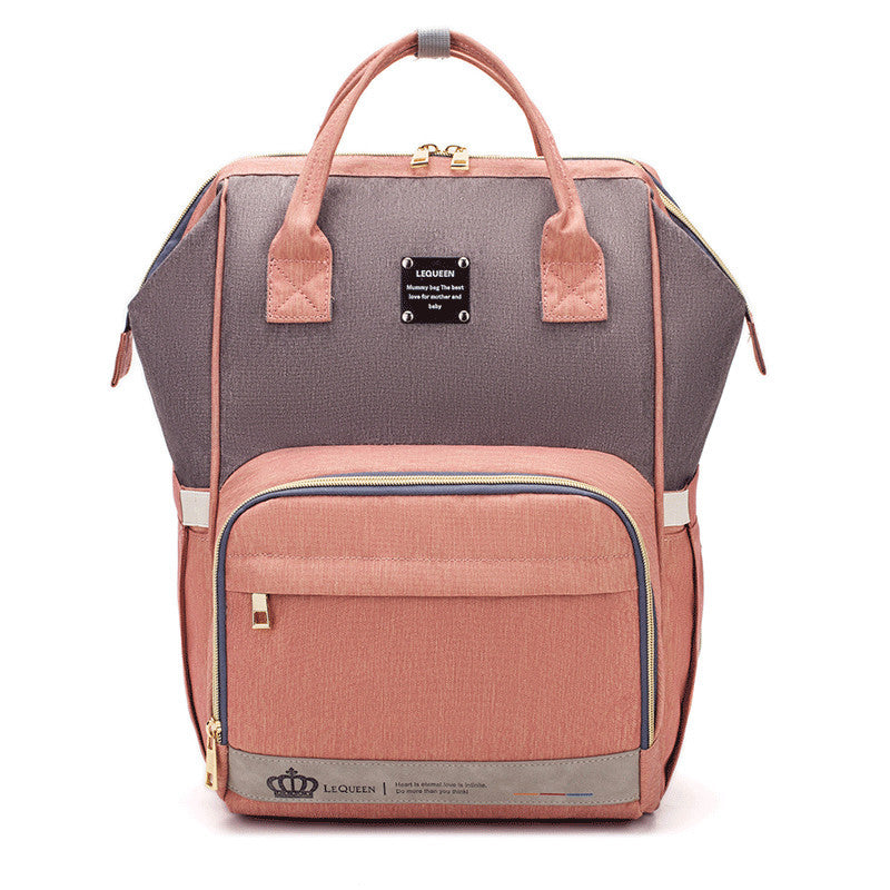 Sheila Merchandise parent-approved diaper backpack in pink and gray with multiple compartments and sturdy handles