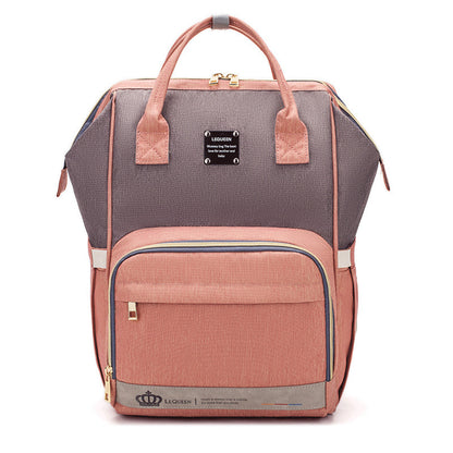 Sheila Merchandise parent-approved diaper backpack in pink and gray with multiple compartments and sturdy handles
